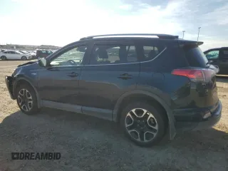 2018 Toyota RAV4 Hybrid SE with VIN JTMJJREV2JD230126, listed as a Copart auction lot 62574005 with 196,846 mi miles and Salvage title. Bid and sale history available at DreamBid. Image 2.