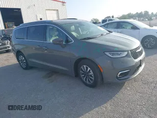 2021 Chrysler Pacifica Hybrid Touring L z VIN 2C4RC1L79MR591650, wystawiony jako IAAI lot #41919785 z przebiegiem 54 052 mil mil oraz . Historia ofert i sprzedaży dostępna na DreamBid. Obrazek 1.