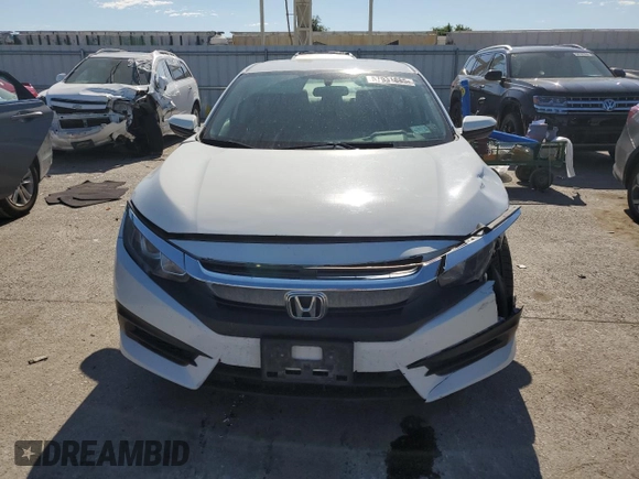 2017 Honda Civic LX with VIN 19XFC2F51HE224834, listed as a Copart auction lot 57951885 with 124,041 mi miles and Salvage title. Bid and sale history available at DreamBid. Image 5.