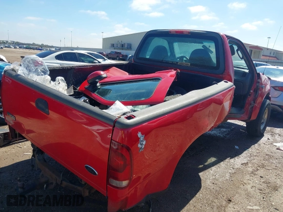2003 Ford F-150 XL with VIN 1FTRF17233NA27543, listed as a IAAI auction lot 41636619 with Not Provided miles and . Bid and sale history available at DreamBid. Image 4.