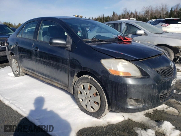 2010 Toyota Yaris with VIN JTDBT4K33A1387279, listed as a Copart auction lot 51213405 with Not Provided miles and Salvage Title. Bid and sale history available at DreamBid. Image 4.