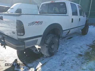 1999 Ford Super Duty F-250 XL with VIN 1FTNW21F9XEC14744, listed as a IAAI auction lot 41290325 with 200,113 mi miles. Bid and sale history available at carsss.com. Image 4.