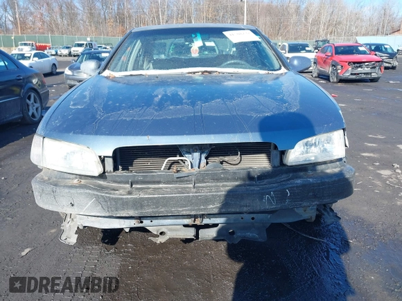 1999 Nissan Altima XE with VIN 1N4DL01D3XC273197, listed as a IAAI auction lot 41508232 with 168,658 mi miles. Bid and sale history available at carsss.com. Image 6.