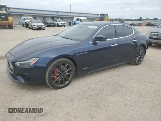 2019 Maserati Ghibli with VIN ZAM57XSS3K1319197, listed as a Copart auction lot 70454084 with 28,584 mi miles and Salvage Title. Bid and sale history available at carsss.com. Image 1.