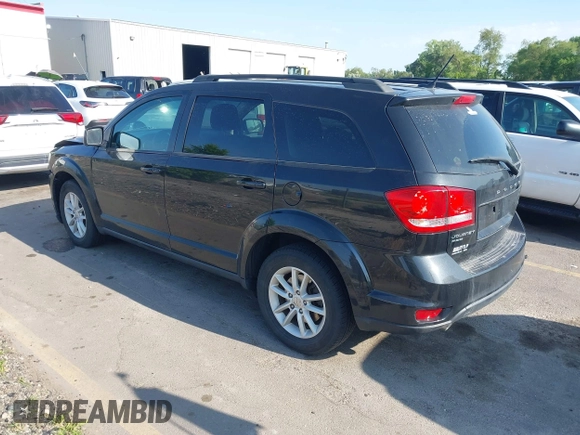 2013 Dodge Journey SXT with VIN 3C4PDDBG1DT606887, listed as a IAAI auction lot 42440507 with 250,836 mi miles and . Bid and sale history available at DreamBid. Image 3.