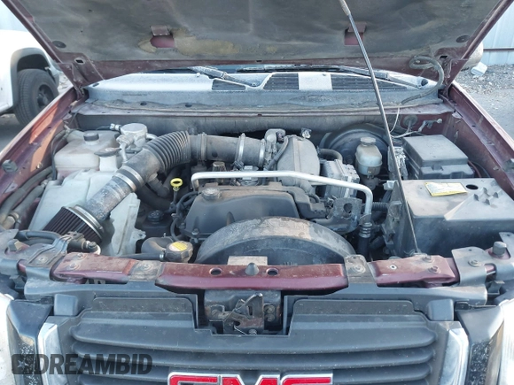 2005 GMC Envoy SLT with VIN 1GKDT13S452115924, listed as a IAAI auction lot 41443704 with 215,402 mi miles. Bid and sale history available at carsss.com. Image 10.