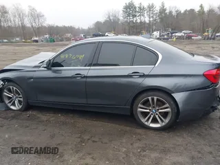 2018 BMW 3 Series with VIN WBA8F1C54JAE93207, listed as a IAAI auction lot 41876781 with 64,749 mi miles and . Bid and sale history available at DreamBid. Image 14.