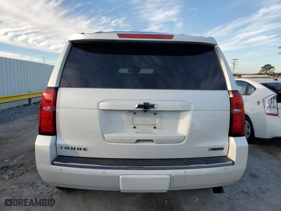 2017 Chevrolet Tahoe Premier with VIN 1GNSCCKC9HR177850, listed as a Copart auction lot 43327575 with 106,389 mi miles and Salvage Title. Bid and sale history available at carsss.com. Image 6.