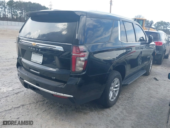 2021 Chevrolet Tahoe LT with VIN 1GNSCNKD8MR248213, listed as a IAAI auction lot 41173322 with 121,393 mi miles. Bid and sale history available at carsss.com. Image 4.