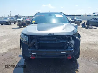 2018 Jeep Compass Trailhawk with VIN 3C4NJDDB2JT198784, listed as a IAAI auction lot 42405539 with 121,553 mi miles and . Bid and sale history available at DreamBid. Image 13.