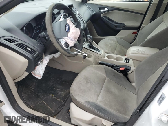 2013 Ford Focus SE z VIN 1FADP3F24DL217259, wystawiony jako Copart lot #51573535 z przebiegiem Nie podano mil oraz Szkoda całkowita • Salvage title. Historia ofert i sprzedaży dostępna na DreamBid. Obrazek 7.