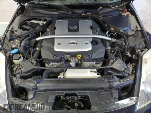2008 Nissan 350Z Touring z VIN JN1BZ34EX8M751913, wystawiony jako Copart lot #86849544 z przebiegiem 33 380 mil mil oraz Szkoda całkowita • Salvage title. Historia ofert i sprzedaży dostępna na DreamBid. Obrazek 11.