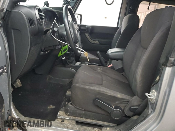 2013 Jeep Wrangler Sport with VIN 1C4AJWAG5DL591897, listed as a Copart auction lot 63218025 with 81,250 mi miles and Clean title. Bid and sale history available at DreamBid. Image 7.