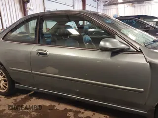 1999 Acura CL Premium z VIN 19UYA2256XL004617, wystawiony jako IAAI lot #41600686 z przebiegiem 262 871 mil mil oraz . Historia ofert i sprzedaży dostępna na DreamBid. Obrazek 13.