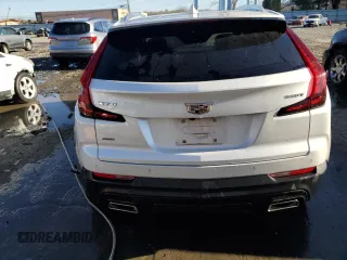 2023 Cadillac XT4 AWD Luxury with VIN 1GYFZBR42PF103438, listed as a Copart auction lot 80647064 with 18,182 mi miles and Salvage Title. Bid and sale history available at carsss.com. Image 6.