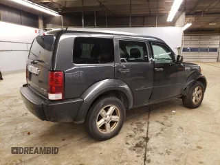 2011 Dodge Nitro SXT z VIN 1D4PT5GK1BW544942, wystawiony jako Copart lot #79857243 z przebiegiem 128 613 mil mil oraz Czysty tytuł • Clean title. Historia ofert i sprzedaży dostępna na DreamBid. Obrazek 3.