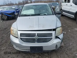 2010 Dodge Caliber SXT z VIN 1B3CB4HA0AD575917, wystawiony jako IAAI lot #41709405 z przebiegiem 213 641 mil mil oraz . Historia ofert i sprzedaży dostępna na DreamBid. Obrazek 12.
