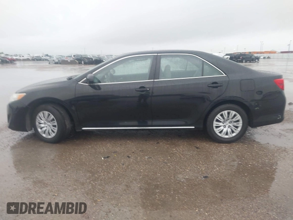 2014 Toyota Camry L with VIN 4T1BF1FK0EU823710, listed as a IAAI auction lot 42153523 with 105,468 mi miles and . Bid and sale history available at DreamBid. Image 14.