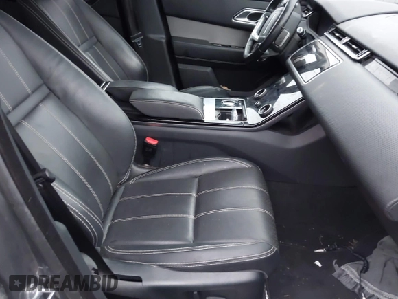 2018 Land Rover Range Rover Velar S z VIN SALYB2RV6JA750501, wystawiony jako IAAI lot #40882723 z przebiegiem 77 338 mil mil oraz . Historia ofert i sprzedaży dostępna na DreamBid. Obrazek 5.