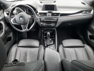 2018 BMW X2 sDrive28i with VIN WBXYJ3C34JEJ91176, listed as a Copart auction lot 63418365 with 62,586 mi miles and Salvage title. Bid and sale history available at DreamBid. Image 8.