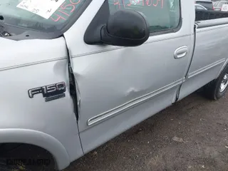 1998 Ford F-150 Standard with VIN 1FTZF18W2WNC27724, listed as a IAAI auction lot 41501654 with 336,342 mi miles. Bid and sale history available at carsss.com. Image 6.