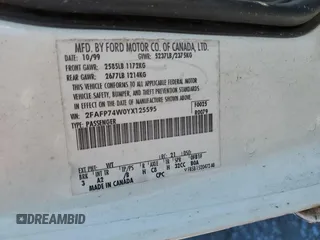 2000 Ford Crown Victoria LX z VIN 2FAFP74W0YX125595, wystawiony jako Copart lot #84675434 z przebiegiem 151 438 mil mil oraz Szkoda całkowita • Salvage title. Historia ofert i sprzedaży dostępna na DreamBid. Obrazek 14.