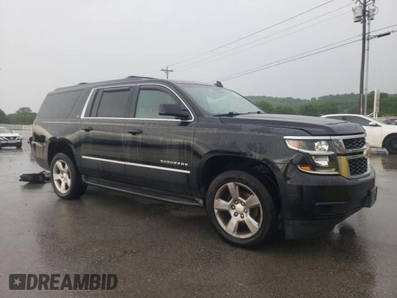 2015 Chevrolet Suburban LT with VIN 1GNSKJKC5FR504863, listed as a Copart auction lot 55305665 with 200,488 mi miles and Clean Title. Bid and sale history available at DreamBid. Image 4.
