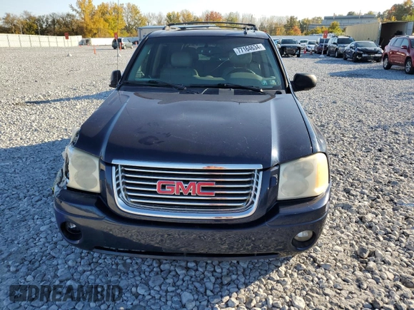 2008 GMC Envoy SLE2 with VIN 1GKDT13S882100069, listed as a Copart auction lot 77164634 with 206,709 mi miles and Salvage Title. Bid and sale history available at DreamBid. Image 5.