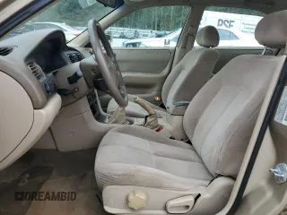 2001 Mazda 626 LX z VIN 1YVGF22C715202574, wystawiony jako Copart lot #54132915 z przebiegiem 237 041 mil mil oraz Szkody całkowita. Historia ofert i sprzedaży dostępna na DreamBid. Obrazek 7.