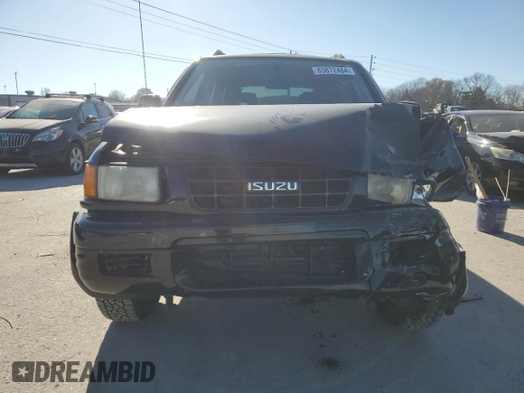 1999 Isuzu Rodeo S with VIN 4S2CK58W2X4336401, listed as a Copart auction lot 83872484 with 191,278 mi miles and Salvage title. Bid and sale history available at DreamBid. Image 5.