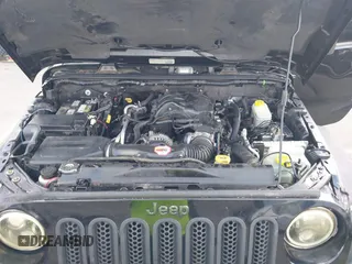 2014 Jeep Wrangler Unlimited Rubicon with VIN 1C4BJWFG0EL116026, listed as a IAAI auction lot 41729074 with 154,597 mi miles. Bid and sale history available at carsss.com. Image 10.