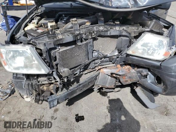 2015 Nissan Frontier SV with VIN 1N6BD0CTXFN708820, listed as a Copart auction lot 56605085 with 119,299 mi miles and Salvage title. Bid and sale history available at DreamBid. Image 11.