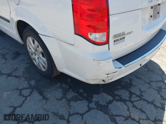 2016 Dodge Grand Caravan SE with VIN 2C4RDGBG9GR401187, listed as a IAAI auction lot 42133432 with 107,742 mi miles and . Bid and sale history available at DreamBid. Image 6.