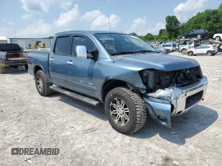 2011 Nissan Titan SL with VIN 1N6AA0EC4BN305296, listed as a Copart auction lot 59001395 with 194,557 mi miles and Salvage title. Bid and sale history available at DreamBid. Image 4.