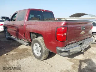 2014 Chevrolet Silverado 1500 LT with VIN 3GCUKREH4EG284122, listed as a IAAI auction lot 41667059 with 243,251 mi miles. Bid and sale history available at carsss.com. Image 3.