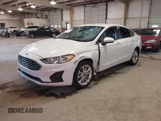 2020 Ford Fusion Hybrid SE with VIN 3FA6P0LU7LR173500, listed as a IAAI auction lot 41368311 with 105,202 mi miles. Bid and sale history available at carsss.com. Image 2.