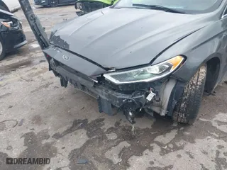 2017 Ford Fusion Energi SE with VIN 3FA6P0PU4HR306053, listed as a IAAI auction lot 41294944 with 88,603 mi miles. Bid and sale history available at carsss.com. Image 6.