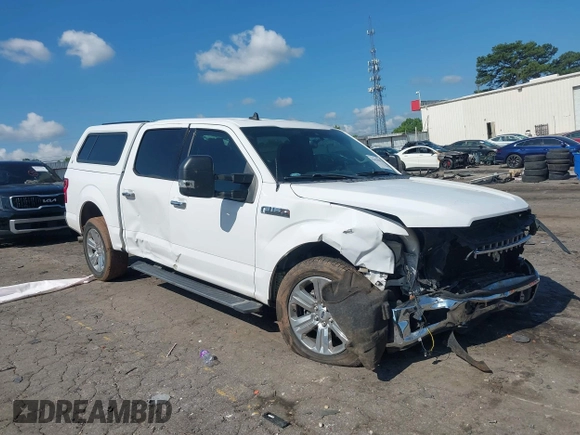 2019 Ford F-150 XL with VIN 1FTEW1C47KKE22590, listed as a IAAI auction lot 42418181 with 123,197 mi miles and . Bid and sale history available at DreamBid. Image 1.