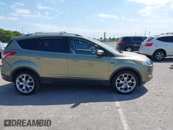 2013 Ford Escape Titanium with VIN 1FMCU0J94DUB06332, listed as a IAAI auction lot 41824742 with 92,633 mi miles. Bid and sale history available at carsss.com. Image 13.