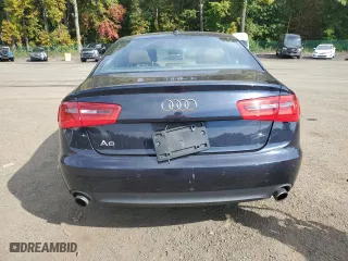 2014 Audi A6 2.0T Premium Plus with VIN WAUGFAFC2EN012212, listed as a Copart auction lot 74503254 with 148,087 mi miles and Salvage Title. Bid and sale history available at carsss.com. Image 6.