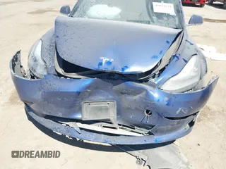 2020 Tesla Model 3 Standard Range Plus z VIN 5YJ3E1EA2LF739866, wystawiony jako IAAI lot #41842179 z przebiegiem 70 089 mil mil oraz . Historia ofert i sprzedaży dostępna na DreamBid. Obrazek 6.