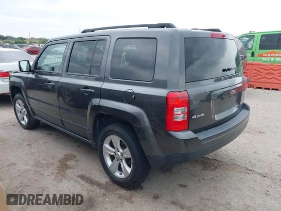 2014 Jeep Patriot Latitude with VIN 1C4NJRFB3ED810819, listed as a IAAI auction lot 41994129 with 145,733 mi miles and . Bid and sale history available at carsss.com. Image 3.