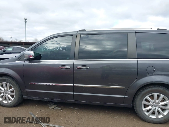 2016 Chrysler Town & Country Limited Platinum with VIN 2C4RC1GG8GR120023, listed as a IAAI auction lot 40808283 with 162,560 mi miles. Bid and sale history available at carsss.com. Image 14.