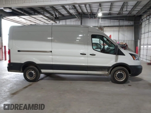 2019 Ford Transit with VIN 1FTBW2CM6KKB73059, listed as a IAAI auction lot 42143526 with 114,147 mi miles. Bid and sale history available at carsss.com. Image 13.