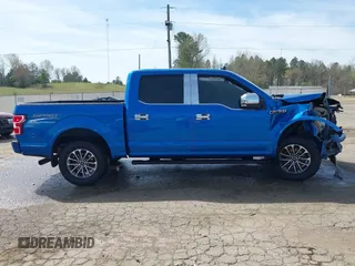 2019 Ford F-150 XL with VIN 1FTEW1EP0KFD47831, listed as a IAAI auction lot 41887760 with 106,495 mi miles and . Bid and sale history available at DreamBid. Image 14.