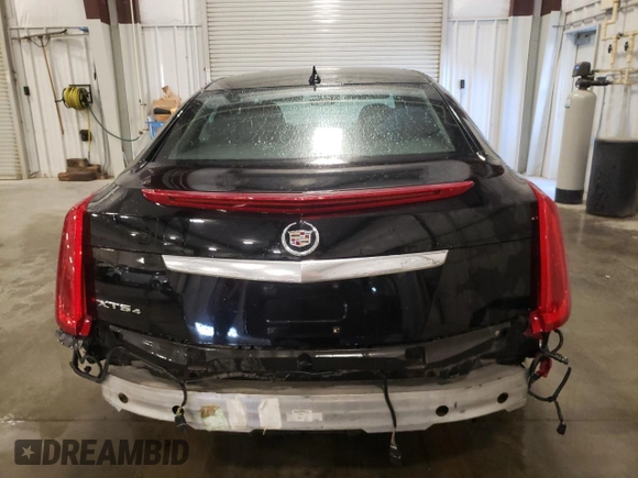 2014 Cadillac XTS Luxury with VIN 2G61N5S33E9246454, listed as a Copart auction lot 63100655 with 110,544 mi miles and Salvage title. Bid and sale history available at DreamBid. Image 6.