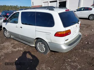 1999 Toyota Sienna LE with VIN 4T3ZF13C5XU161001, listed as a IAAI auction lot 41309712 with 364,688 mi miles. Bid and sale history available at carsss.com. Image 3.