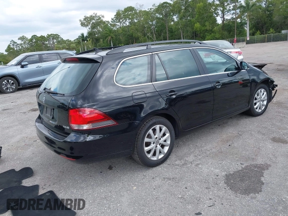 2013 Volkswagen Jetta SportWagen SE with VIN 3VWPX7AJ4DM655174, listed as a IAAI auction lot 42072632 with 65,899 mi miles. Bid and sale history available at carsss.com. Image 4.