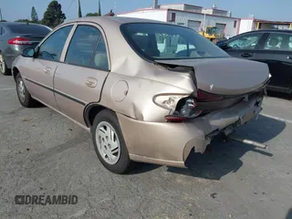 1999 Ford Escort LX with VIN 1FAFP10P3XW138847, listed as a IAAI auction lot 41216936 with 62,672 mi miles. Bid and sale history available at carsss.com. Image 3.
