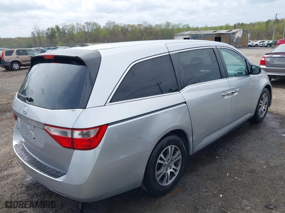 2011 Honda Odyssey EX-L with VIN 5FNRL5H69BB031983, listed as a IAAI auction lot 41947443 with 148,111 mi miles. Bid and sale history available at carsss.com. Image 4.